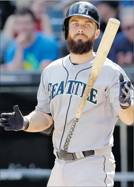  ?? — THE ASSOCIATED PRESS FILES ?? Seattle Mariners outfielder Dustin Ackley is happy new son Parson, who was born six weeks early, has been removed from an incubator into a normal hospital setting.