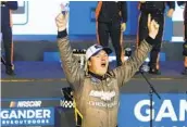  ?? RALPH FRESO AP ?? Alpine’s Sheldon Creed celebrates after winning the season championsh­ip in the NASCAR Truck Series.