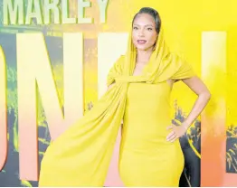  ?? AP ?? Styled by Ivy Coco Maurice, Naomi Cowan paid tribute to her character, Marcia Griffiths on the red carpet of the London premiere of ‘Bob Marley: One Love’ in this ‘Naturally’ majestic dress designed by West African designer Kwame Adusei based in the United States.
