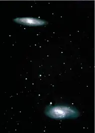  ?? David Cater/Star-Gazing ?? This image is of two galaxies near Leo. These galaxies are close enough that they are influenced by one another’s gravity and travel through space-time as a pair. The pair lies around 40 million light-years away.