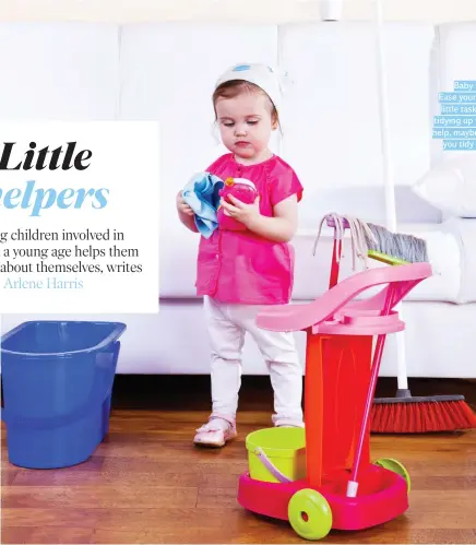  ??  ?? Baby steps: Ease your child into little tasks such as tidying up with lots of help, maybe singing as you tidy together