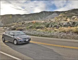  ?? Signal file photo ?? A car drives past the CEMEX mining site as seen from Soledad Canyon Road near Agua Dulce Canyon Road in Canyon Country.