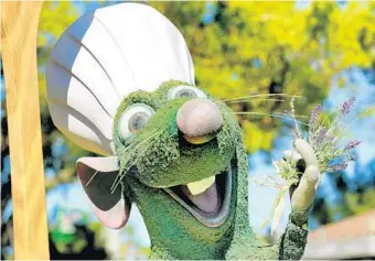  ?? JOE BURBANK/ORLANDO SENTINEL ?? If you missed Remy’s topiary debut at this year’s Epcot Internatio­nal Flower & Garden Festival at Walt Disney World, you’ll get your chance on July 15.