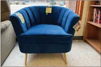  ?? COURTESY MACOMB HABITAT ?? This blue velvet chair is one of the great items at the ReStore in Shelby Township.