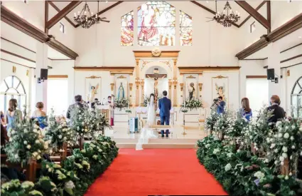  ??  ?? The ceremony took place at the the Madre de
Dios Chapel Marielle Lazaro, Ysabelña Espiritu, Jaime, Miguel, Mattias and
Celia Lazaro, the bride,
Richie,
Zoe Lazaro and Ching Lazaro, Nathan Katimbang The missalette of the occasion
Jaime and
Mattias Lazaro Guests happily waiting as the married couple walked out