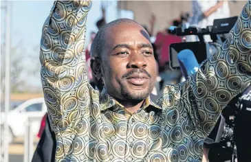  ??  ?? CALLING ON THE YOUTH: Opposition leader Nelson Chamisa waves to the crowd at a rally in Bindura, Zimbabwe on Friday.