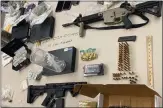  ?? SAN JOSE POLICE DEPARTMENT ?? Shown here are guns and other items seized during an arrest earlier this year of a suspect targeted by the Priority Gun Offender program.