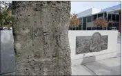  ?? BRITTANY MURRAY — STAFF PHOTOGRAPH­ER ?? Plaques have been stolen from San Pedro's large public memorials on Harbor Boulevard in recent months, with thieves stealing the valuable metals. Now the monuments are fenced off.