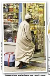  ??  ?? Senegalese and others use remittance services at this W. 116th St. store to send money to their homelands.