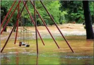  ?? PHOTO SUBMITTED BY LORI ROHRBACH ?? Floodwater­s from Hay Creek swamp a playset in Birdsboro’s Rustic Park on Monday, Aug. 13.