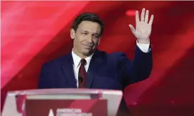  ??  ?? Ron DeSantis waves as he is introduced at CPAC in Orlando, Florida, on 26 February. Photograph: John Raoux/AP