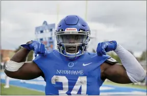  ?? PAUL DICICCO — FOR THE NEWS-HERALD ?? Running back Tabyus Taylor after scoring on a 15-yard run in the fourth quarter in Notre Dame College’s win over Charleston April 17in the Mountain East Conference championsh­ip game.