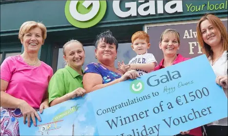  ??  ?? Margaret Frayne, store owner of Frayne’s Gala, with staff member Gusia Ruffinyi, holiday winner Peggy Owens, her grandson Finn Kenny, Mary Browne and Gala retail operations executive Lisa Kenny.