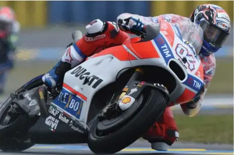  ?? JEAN-FRANCOIS MONIER/AFP/GETTY IMAGES ?? Ducati’s bikes are featured in racing, including the MotoGP with Italian rider Andrea Dovizioso, above, and Superbike events.