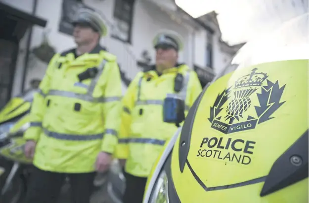  ?? PICTURE: ANDREW MILLIGAN/PA ?? Police Scotland would not investigat­e some low level crimes under the proposed plan, which could see ‘minor’ offences such as vandalism or anti-social behaviour written off