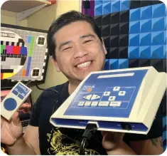  ??  ?? Below: Quang is smiling, he owns a Tomy!