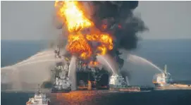  ?? U.S. COAST GUARD VIA GETTY IMAGES ?? Fire boat response crews battle the blazing remnants of the offshore oil rig Deepwater Horizon in the Gulf of Mexico on April 21, 2010, near New Orleans.