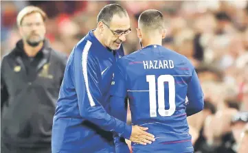  ?? — Reuters photo ?? Chelsea’s Eden Hazard talks to manager Maurizio Sarri during the League Cup third round match at Anfield in this Sept 26 file photo.