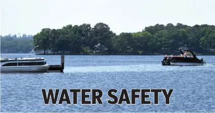  ?? The Sentinel-Record/Lance Brownfield ?? ■ A boat approaches the dock at Futrell Marine on Lake Hamilton on Tuesday.