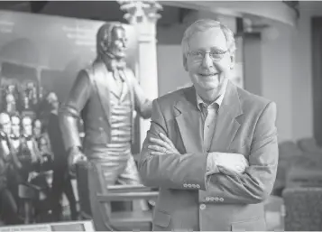  ?? JACK GRUBER, USA TODAY ?? Senate Majority Leader Mitch McConnell, with a statue of Kentucky Sen. and House Speaker Henry Clay at the University of Louisville, is his state’s longest- serving senator.