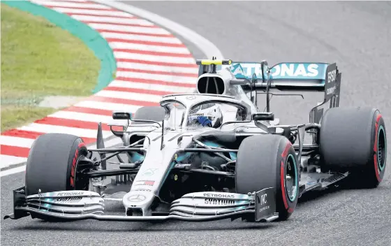  ??  ?? Mercedes’ Valtteri Bottas takes part in a practice session at Suzuka yesterday.