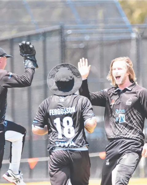  ?? Picture: Wes Cusworth ?? North Geelong captain Tom Mathieson (right) charges in to celebrate a wicket with teammates.