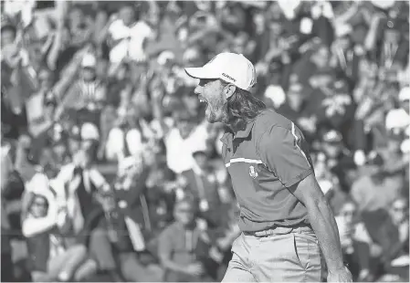  ?? FRANCK FIFE/AFP/GETTY IMAGES ?? Europe’s English golfer Tommy Fleetwood reacts during his foursomes match on Saturday in the 42nd Ryder Cup at Le Golf National. Fleetwood and teammate Francesco Molinari are 4-0 after play Friday and Saturday.