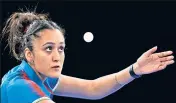  ?? AP ?? India's Manika Batra in action against South Africa's Musfiquh Kalam during the table tennis team event on Friday.