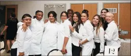  ??  ?? Girls from The Glass Slipper culinary program pose for a photo. The Glass Slipper is a nonprofit organizati­on that provides life-changing programs for girls in foster care and group homes, which Clara Jeanne LaCelle supports.
