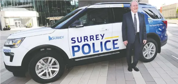  ?? NICK PROCAYLO FILES ?? Surrey Mayor Doug McCallum poses with a prototype of a Surrey Police vehicle in 2019. He says the province isn't interested in a referendum on Surrey transition­ing to an independen­t police service. “Our residents are clearly in support of this transition,” he says.