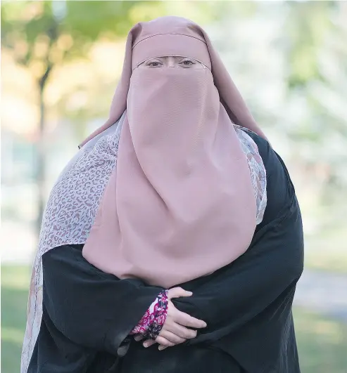  ?? GRAHAM HUGHES / THE CANADIAN PRESS ?? Warda Naili of Montreal, a convert to Islam, started wearing the niqab six years ago and says she finds the garment liberating because people she meets now relate to her based on who she is rather than what she looks like.