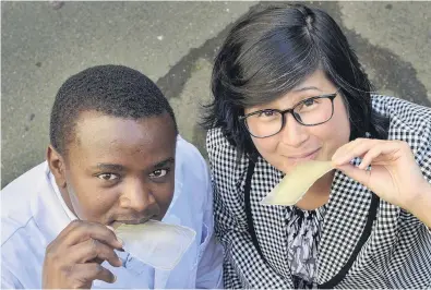  ?? PHOTO: GERARD O’BRIEN ?? Taste test . . . University of Otago food science PhD student Stephen Giteru and head of department Prof Indrawati Oey are working on a project to create edible packaging for food and animal feed.