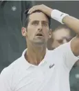  ??  ?? 0 Novak Djokovic: Knee twinge.