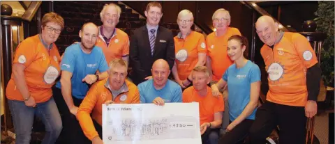  ??  ?? A cheque for €9,350, proceeds from the 24 hour pool-bike spinathon in Club Amber, was presented last week to Cycle Against Suicide. Front: Trish Quinn; Joey Donohoe; Cycle Against Suicide local ambassador Joe Dixon; Club Amber manager Anto Kelly; Cycle...