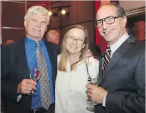  ??  ?? From left, Tom Schonberg, president and CEO of the Queensway Carleton Hospital, with his wife, Ene, and BrazeauSel­ler law partner Ron Prehogan, chair of the hospital’s capital campaign.