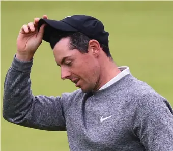  ?? GETTY IMAGES ?? HEADING HOME: Rory McIlroy made a big charge yesterday at Royal Portrush, but the Northern Ireland native fell short of the cut line in the British Open.