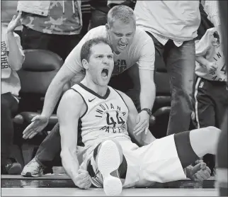  ?? DARRON CUMMINGS/AP PHOTO ?? Bojan Bogdanovic of the Pacers reacts after hitting a 3-point shot and being fouled during the second half of Friday’s NBA playoff game against the Cavaliers at Indianapol­is.