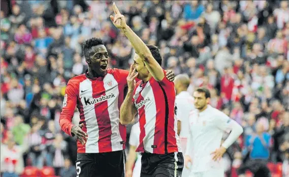  ?? FOTO: AIOL ?? No le paran Williams celebra con Aduriz un gol marcado al Sevilla en San Mamés hace un par de temporadas