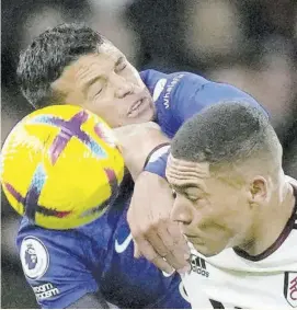  ?? (Photo: AP) ?? Chelsea’s Thiago Silva (left) receives an arm to the face from Fulham’s Carlos Vinicius while battling for the ball during their English Premier League match at Craven Cottage in London, England, on Thursday, January 12.