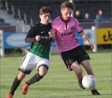  ??  ?? Adam Rochford of Wexford Youths tries to break away from Dylan O’Connor (Bray Wanderers).