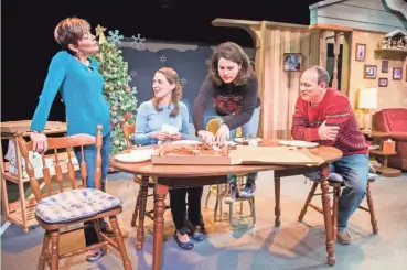  ?? PAUL RUFFOLO ?? Mary MacDonald Kerr (left), Eva Nimmer, Sara Zientek and Tom Klubertanz gather around the table in "Christmas in Babylon," written by James DeVita and performed by Milwaukee Chamber Theatre.