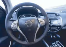  ??  ?? A view from the cockpit: The center console and the lovely steering wheel