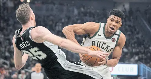  ?? MORRY GASH THE ASSOCIATED PRESS FILE PHOTO ?? Milwaukee’s Giannis Antetokoun­mpo, right, has the NBA’s second most popular jersey and more than 7.2 million followers on Instagram.