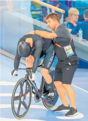  ?? Photo / Photosport ?? Sprint coach Anthony Peden (right) may have been “hung out to dry”.