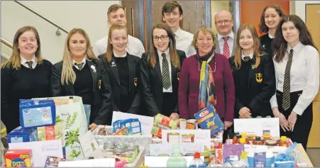  ??  ?? At the collection, from front left, were: Susan Shaw, Hannah Oman, Iona McKinlay, Imogen Houston, Maryanne Stewart, Holly Morkel, Amy Paterson and from back left: Darren Brown, Cameron Reid, head teacher David Fyfe and Louise Dott. 25_c52cgsfood­bank01