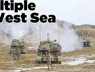  ?? AP ?? A South Korean army self-propelled howitzer fires during a military exercise near the border with North Korea yesterday.