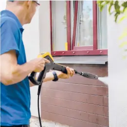  ?? DREAMSTIME ?? Pressure-washing is a powerful tool to clean your house, driveway or decks, but it must be used carefully.