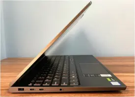  ??  ?? The Lenovo Yoga C940 15 has two USB-C ports and a proprietar­y charging port on the left side, plus a USB-A port on the right.