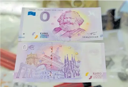  ?? DPA ?? Homenaje. Una imagen del billete de cero euros con la imagen de Marx, el gran teórico del comunismo.