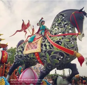  ??  ?? Disney's famous daily parades include celebrated Chinese legendary figures such as Mulan